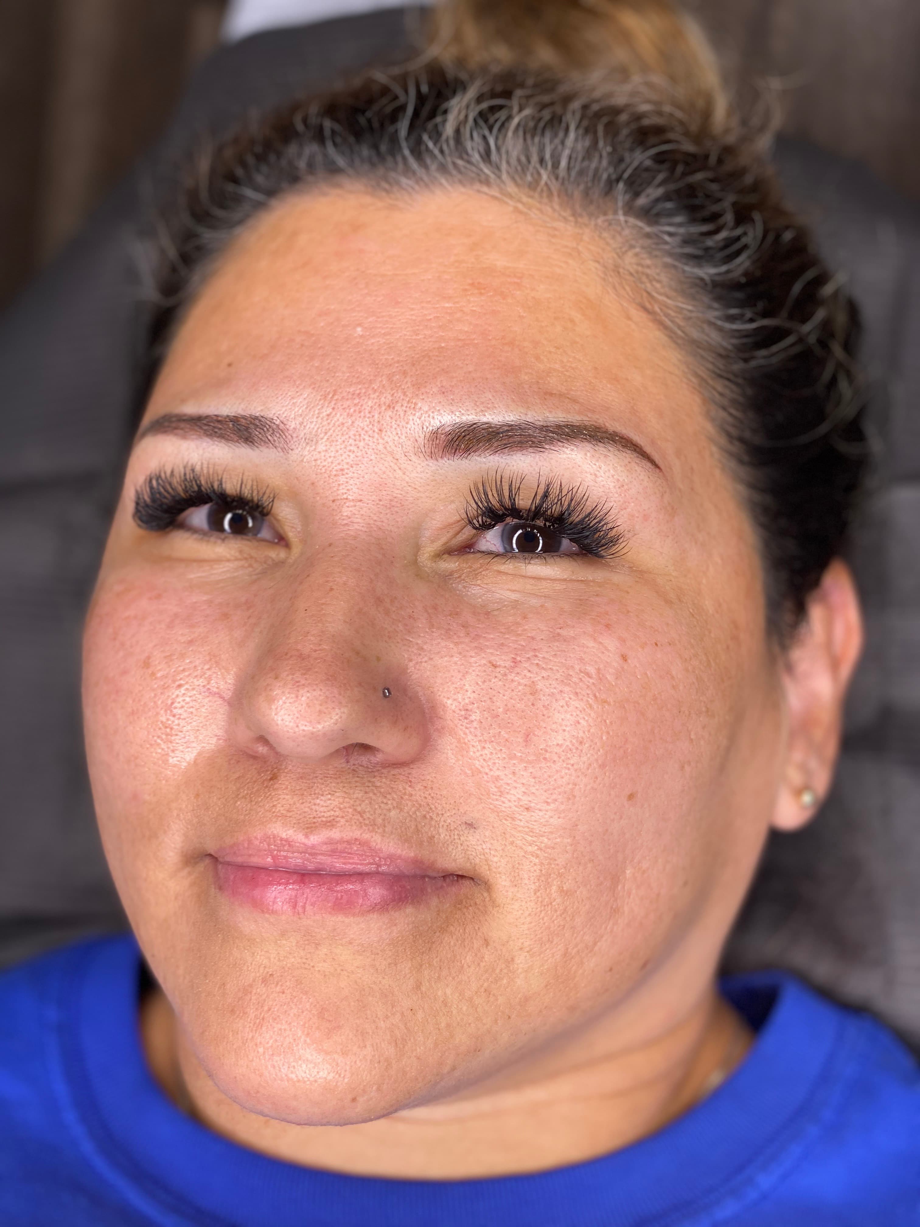 Client with softly shaded ombre powder brows